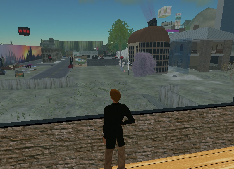 Peter Krogstad in his offices looking out the window  to the East on moving day.